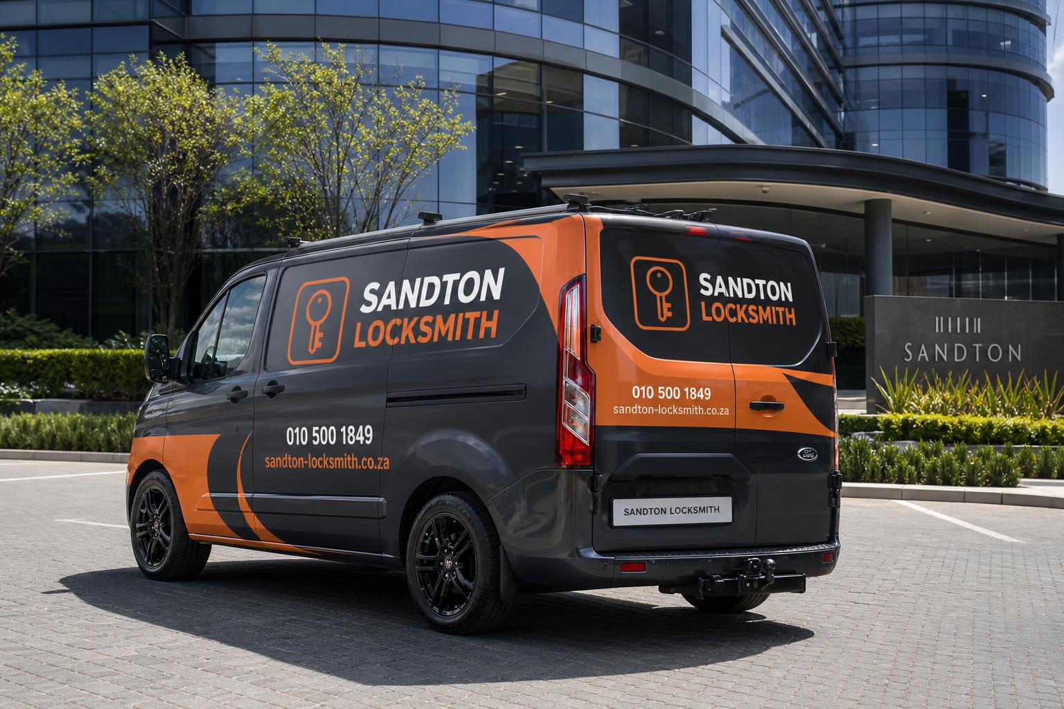 Branded Sandton Locksmith van outside a Sandton office park